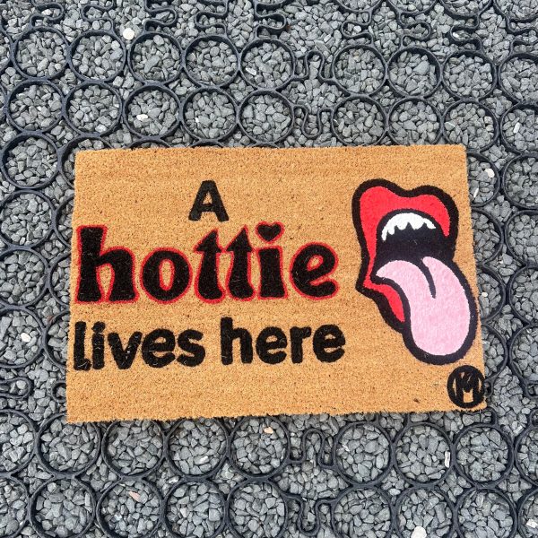 A HOTTIE LIVES HERE MAT on Sale